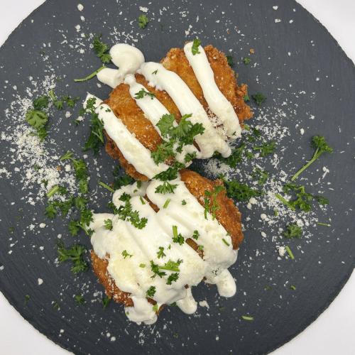 Ganzer knusprig frittierter Maiskolben