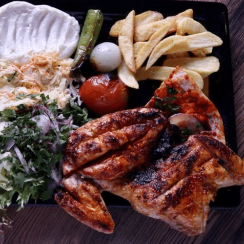 Halbes gegrilltes Hähnchen