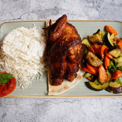 Gegrillte halbe Hähnchen mit Saison Gemüse und Basmati Reis