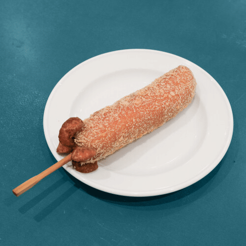 Geflügelwurst Corndog