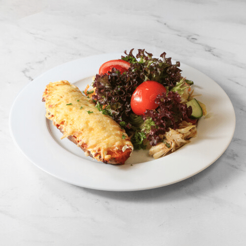 Überbackene Süßkartoffel mit Crème fraîche und Käse