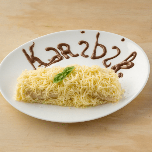 Karibik Ex (Salat, Prosciutto, Käse, Kirschtomaten, Sauerrahm)