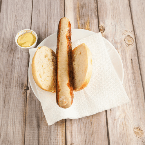 Bratwurst im Brötchen mit Senf