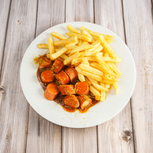 Currykäsewurst mit Pommes