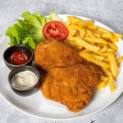 Schnitzel mit Pommes oder Hausgemachte Kartoffeln