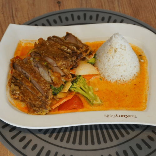 Knusprig gebratene Ente mit einem Curry nach Wahl