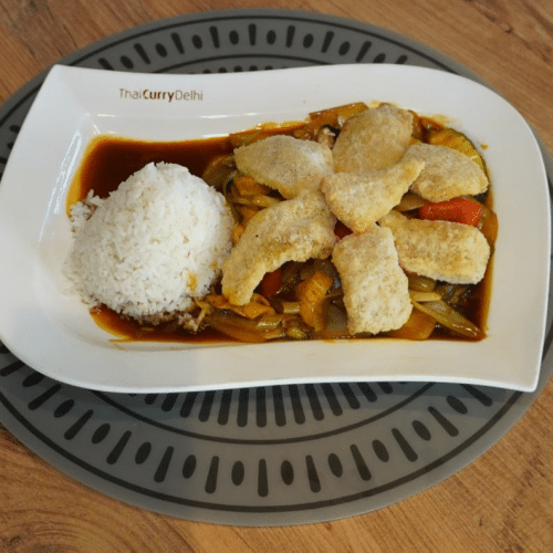 Paniertes Fischfilet mit verschiedenem Gemüse